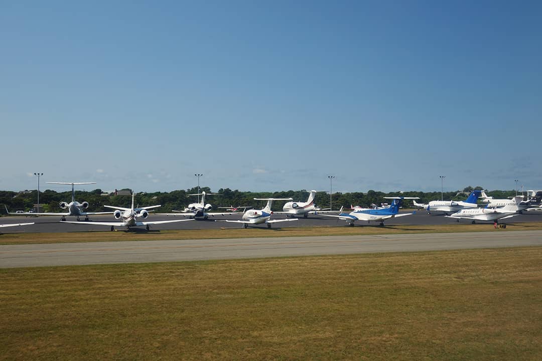 Private jets parked at Nantucket island's memorial airport in Massachusetts, USA.